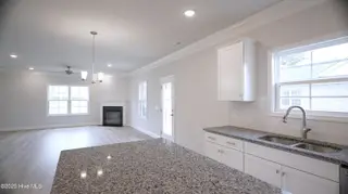 1215 Opaca Drive SE, Bolivia, NC 28422 – photo 15: Kitchen and Living Room