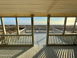 4021 E Beach Drive, Oak Island, NC 28465 – photo 1: IMG_2383