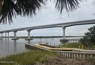 305 Planters Ridge Drive SW, Sunset Beach, NC 28468 — 3-bedroom home in Sea Trail Plantation, Sunset Beach, NC, photo 17 of 17: Bridge to Sunset