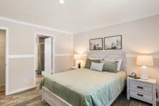 6745 Lewis Drive SE, Winnabow, NC 28479 – photo 16: Master bedroom