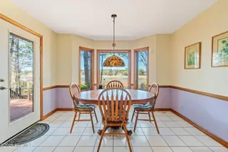 1461 S Shore Drive, Southport, NC 28461 – photo 15: Dining Room Looking Out
