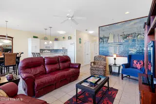 1700 Salter Path Road N102 The Ocean Club, Indian Beach, NC 28512 – photo 5: Living room overlooking sound