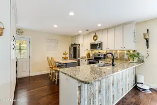 131 NE 33rd Street, Oak Island, NC 28465 – photo 22: kitchen with added storage