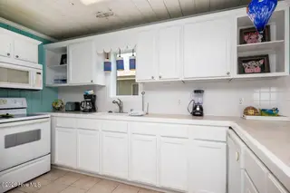 1025 W Beach Drive, Oak Island, NC 28465 – photo 17: 1025 W Beach 34