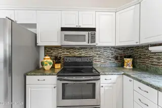126 NE 5th Street, Oak Island, NC 28465 – photo 19: shniderproductions.com-13
