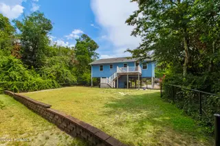 133 Doe Drive, Emerald Isle, NC 28594 – photo 8: Spacious backyard in Emerald Isle