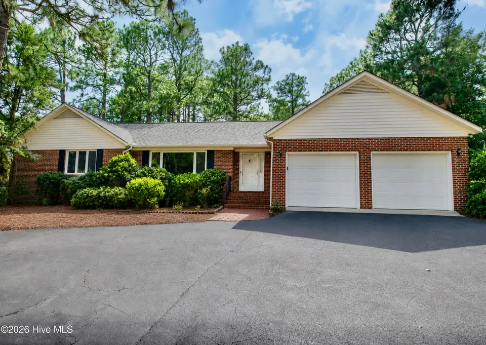 48 Martin Drive, Whispering Pines, NC 28327 – photo 1 of 43: 48 Martin Dr Front
