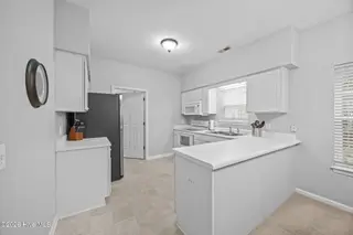 2207 Locksley Woods Drive A, Greenville, NC 27858 – photo 15: 15-web-or-mls-BLS_0033