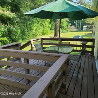 107 Eagle Ridge Drive, Dudley, NC 28333 — 4-bedroom manufactured home in Eagle Ridge, Dudley, NC, photo 16 of 17: Back Deck
