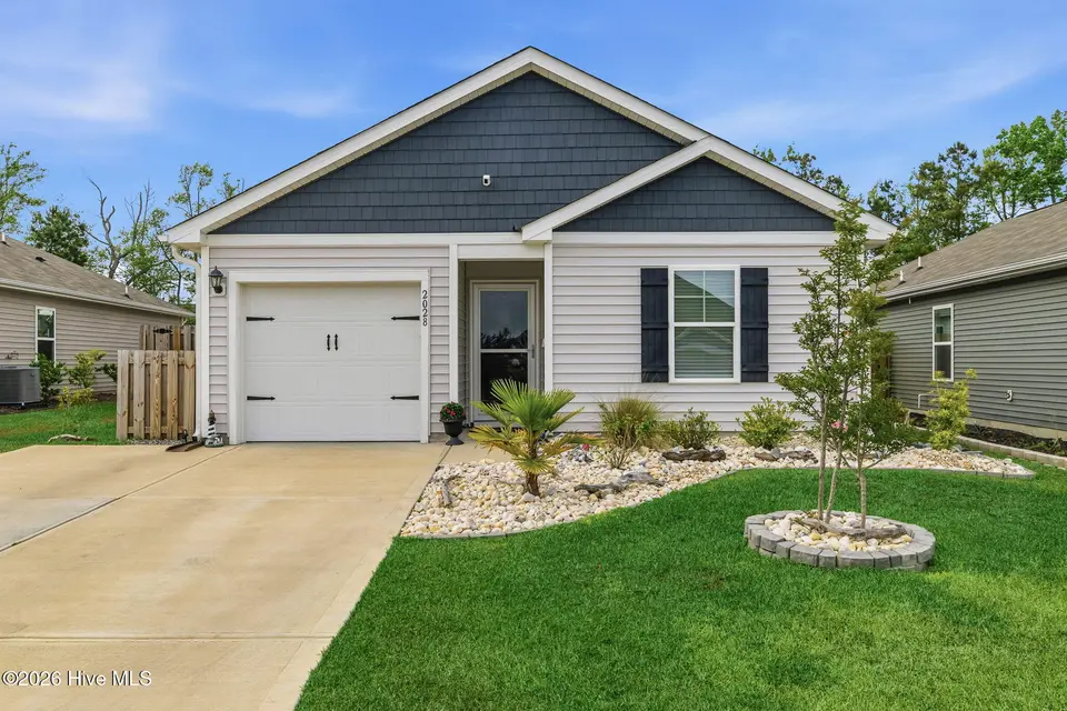 2028 Course Lane, Surf City, NC 28445 – photo 1 of 42: Front- Updated Grass