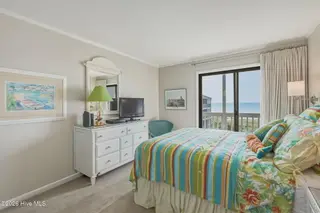 2111 W Fort Macon Road 313 Dunescape, Atlantic Beach, NC 28512 – photo 17: Primary bedroom