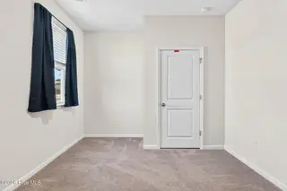1573 Murre Court SE, Bolivia, NC 28422 — 5-bedroom home in Avalon, Bolivia, NC, photo 20 of 48: Bedroom 1 - 1st floor