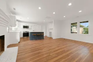 109 Pleasant Drive, Beaufort, NC 28516 – photo 11: Dining and den with fireplace