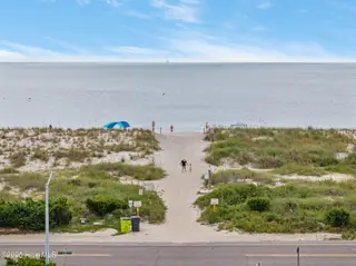 2906 E Dolphin Drive, Oak Island, NC 28465 – photo 4: 22-web-or-mls-DJI_20250916105034_0946_D