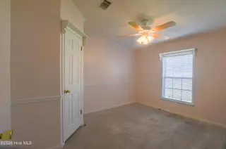 118 Woodland Drive, Swansboro, NC 28584 — 3-bedroom manufactured home in Hadnot Creek, Swansboro, NC, photo 11 of 16: Bedroom 2