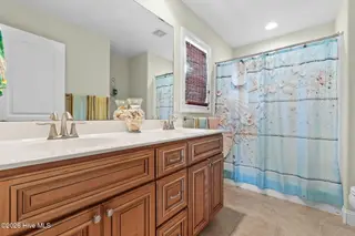 133 NE 3rd Street, Oak Island, NC 28465 – photo 13: Owners Retreat