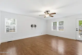 565 W Philadelphia Avenue, Pinebluff, NC 28373 – photo 10: Living Room door to deck