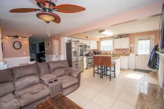 310 Holly Lane, Cape Carteret, NC 28584 – photo 11: Great room towards kitchen