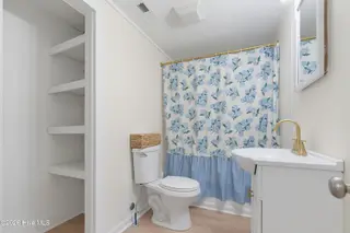 728 Warrior Trail, Whiteville, NC 28472 – photo 21: Spacious Linen Closet!