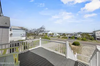 5127 W Beach Drive, Oak Island, NC 28465 – photo 17: 6_front porch