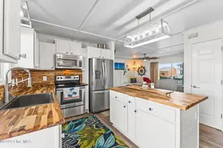 1012 W Dolphin Drive, Oak Island, NC 28465 – photo 4: shniderproductions.com-26