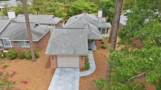 310 Pinehurst Trace Drive, Pinehurst, NC 28374 – photo 4: 6-web-or-mls-DJI_20260714121053_0721_D