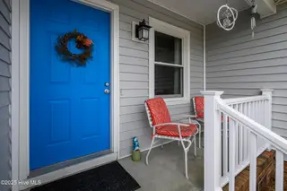 6203 Gondolier Drive, New Bern, NC 28560 – photo 9: Rocking Chair Front Porch