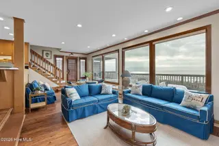 111 Dogwood Circle, Pine Knoll Shores, NC 28512 – photo 20: Living room with fireplace