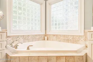 725 Lake Forest Drive SE, Pinehurst, NC 28374 – photo 24: Primary Ensuite
