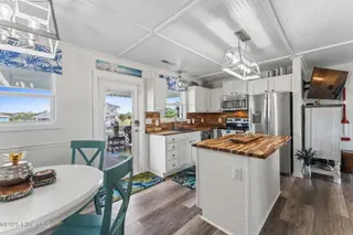 1012 W Dolphin Drive, Oak Island, NC 28465 – photo 22: shniderproductions.com-28