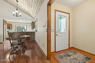 930 Tidewater Lane, Carolina Beach, NC 28428 – photo 14: Living to Foyer and WIC entry