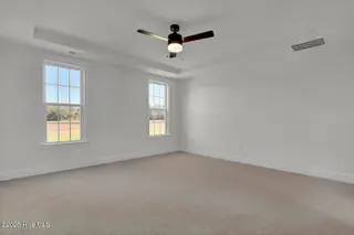 229 Planters Walk, Hampstead, NC 28443 – photo 12: Primary Bedroom 1