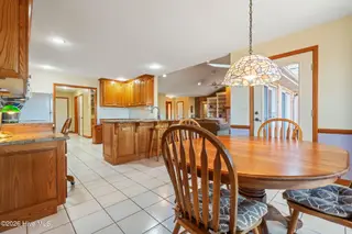 1461 S Shore Drive, Southport, NC 28461 – photo 16: Dining Room & Kitchen