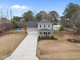 893 Dan Owen Drive, Hampstead, NC 28443 – photo 2: 3-web-or-mls-DJI_20260302112613_0750_D
