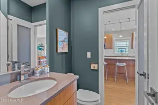 7403 E Beach Drive, Oak Island, NC 28465 – photo 20: Modern Primary Bathroom Retreat