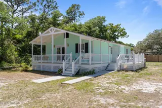 109 NE 17th Street, Oak Island, NC 28465 – photo 1: 1-web-or-mls-BTS00755