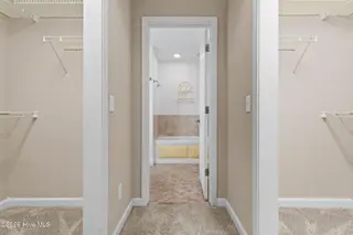 76 Calabash Drive, Calabash, NC 28467 – photo 14: Owners bedroom to owners bth