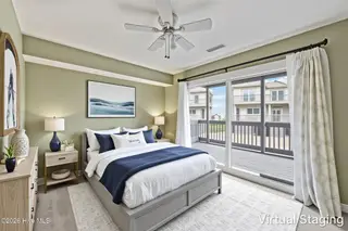 1928 New River Inlet Road 214, North Topsail Beach, NC 28460 – photo 13: Guest Bedroom 1 Staged