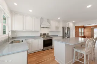 413 Club Colony Drive, Atlantic Beach, NC 28512 – photo 10: Kitchen with quartz countertops