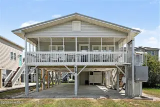 419 1st Street, Sunset Beach, NC 28468 – photo 1: 002_file_7038