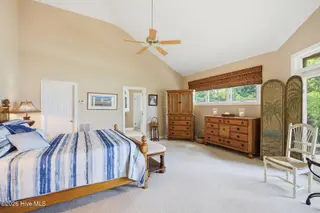 142 Oakleaf Drive, Pine Knoll Shores, NC 28512 – photo 21: Primary Bedroom