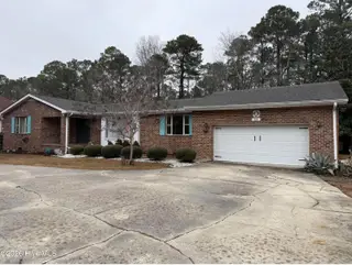 60 Country Club Drive, Shallotte, NC 28470 – photo 2: 60 cc front