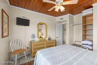 103 24th Street, Emerald Isle, NC 28594 — 4-bedroom townhome in Emerald Isle By The Sea, Emerald Isle, NC, photo 17 of 51: Bedroom 1