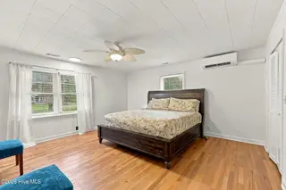 123 Willis Drive, Harkers Island, NC 28531 — 2-bedroom home, Harkers Island, NC, photo 13 of 34: Primary Suite
