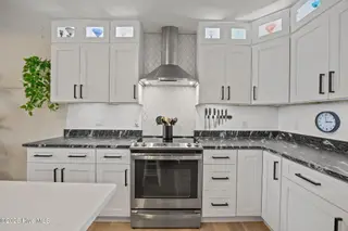 111 NW 10th Street, Oak Island, NC 28465 – photo 17: 28 kitchen