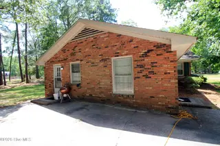 6000 River Road 1, Washington, NC 27889 – photo 8: concrete drive and side entrance