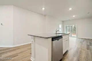 3583 Whaley Way NW, Ash, NC 28420 — 3-bedroom townhome in Brunswick Plantation, Ash, NC, photo 6 of 34: Kitchen Island