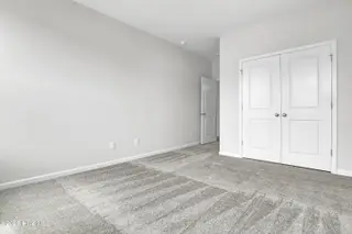 6803 Fellowship Drive, Leland, NC 28451 — 4-bedroom townhome in Grand Park, Leland, NC, photo 13 of 38: Bedroom 3