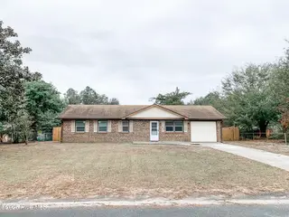 213 Santa Ana Drive, Wilmington, NC 28412 — 3-bedroom home in Monterey Heights, Wilmington, NC, photo 1 of 13: front