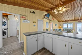 1011 W Beach Drive, Oak Island, NC 28465 – photo 17: 29-web-or-mls-IMG_2395